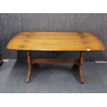 An Ercol refectory style dining table, 152 x 84cm.