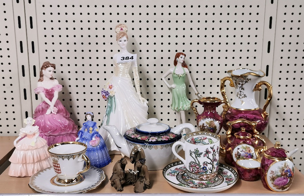 A group of Coalport figurines and other items.