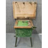 An antique hand operated cast iron and zinc washing machine, H. 82 W. 76cm.