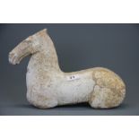 A Han Dynasty (202 BC–220 AD) type model of a horse with old restoration, L.36 cm. Probably of the