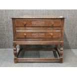 A 1920's oak writing desk, 82 x 53 x 76cm.