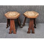 A pair of marquetry decorated oak Arts and Crafts stools/ side tables, W. 28, H. 37cm.