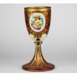 A fine hand painted and gilt Bohemian glass goblet, H. 18cm.