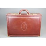 A gentleman's Cartier leather attaché case, W.46cm, H. 32cm.