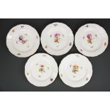 Five KPM Dresden hand painted porcelain plates (two A/F), Dia. 21.5cm.