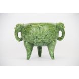 A Chinese green hard stone censer, W. 15cm. H. 11.5cm. A/F to both handles.