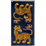 A Tibetan hand woven nomadic wool tiger rug, 170 x 97cm.