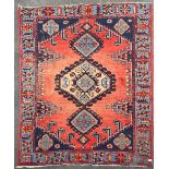 An antique Eastern hand woven wool rug, 160x215 cm.