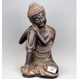 A Chinese carved wooden figure of a resting Buddha, H. 34cm.