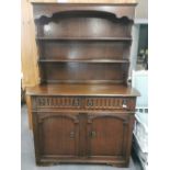 A carved oak Welsh dresser, 178 x 121 x 47cm.