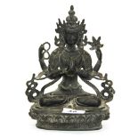 A Tibetan bronze figure of a seated Tara, H. 22cm.