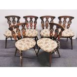 A set of six country dining chairs.