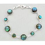 A 925 silver bracelet set with cabochon cut labradorite, L. 19cm.