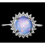 A 925 silver cluster ring set with a cabochon cut opal and white stones, (J).
