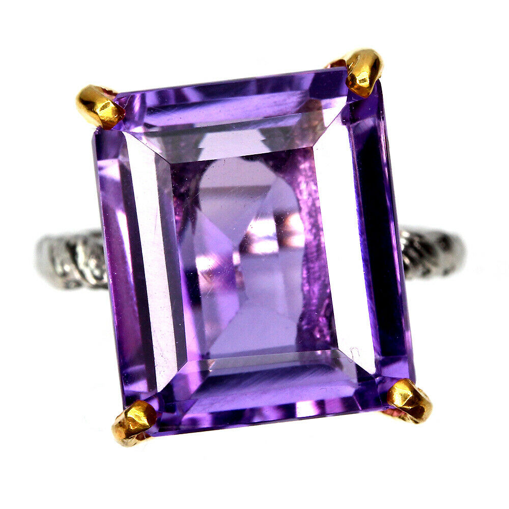 A 925 silver ring set with a large emerald cut amethyst, (N), amethyst approx. 16ct.
