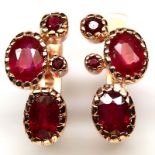 A pair of 925 silver rose gold gilt earrings set with oval cut rubies, L. 2cm.