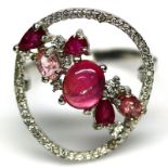 A 925 silver ring set with rubies and white stones, (P.5).