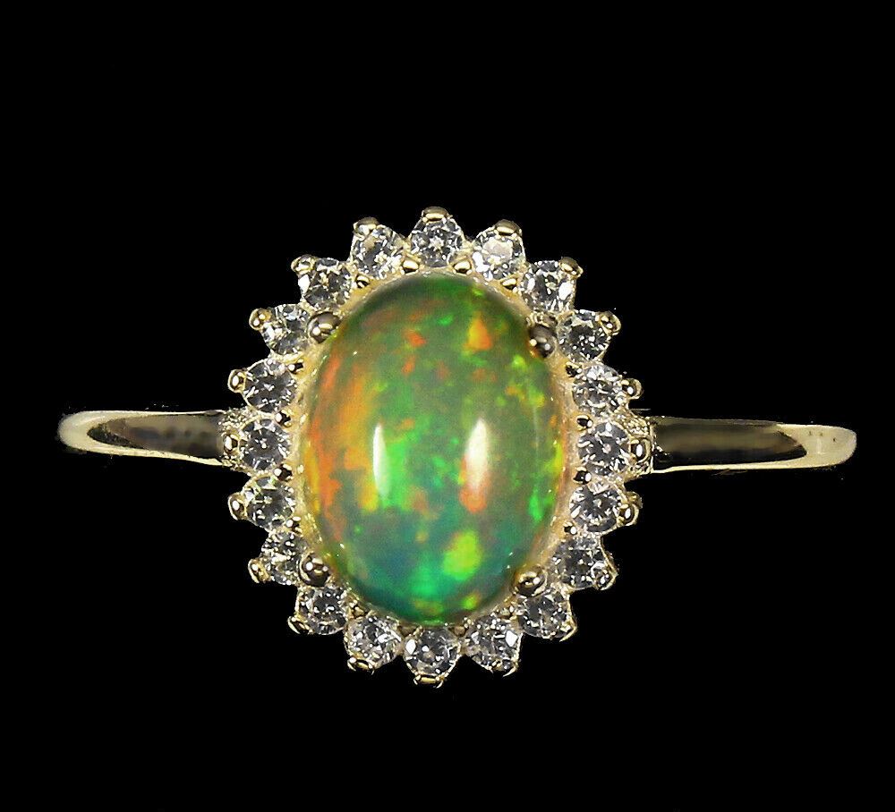 A matching 925 silver gilt cluster ring set with cabochon cut opal and white stones, (N.5).
