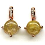 A pair of 925 silver rose gold gilt drop earrings set with rutile quartz and white stones, L. 2.
