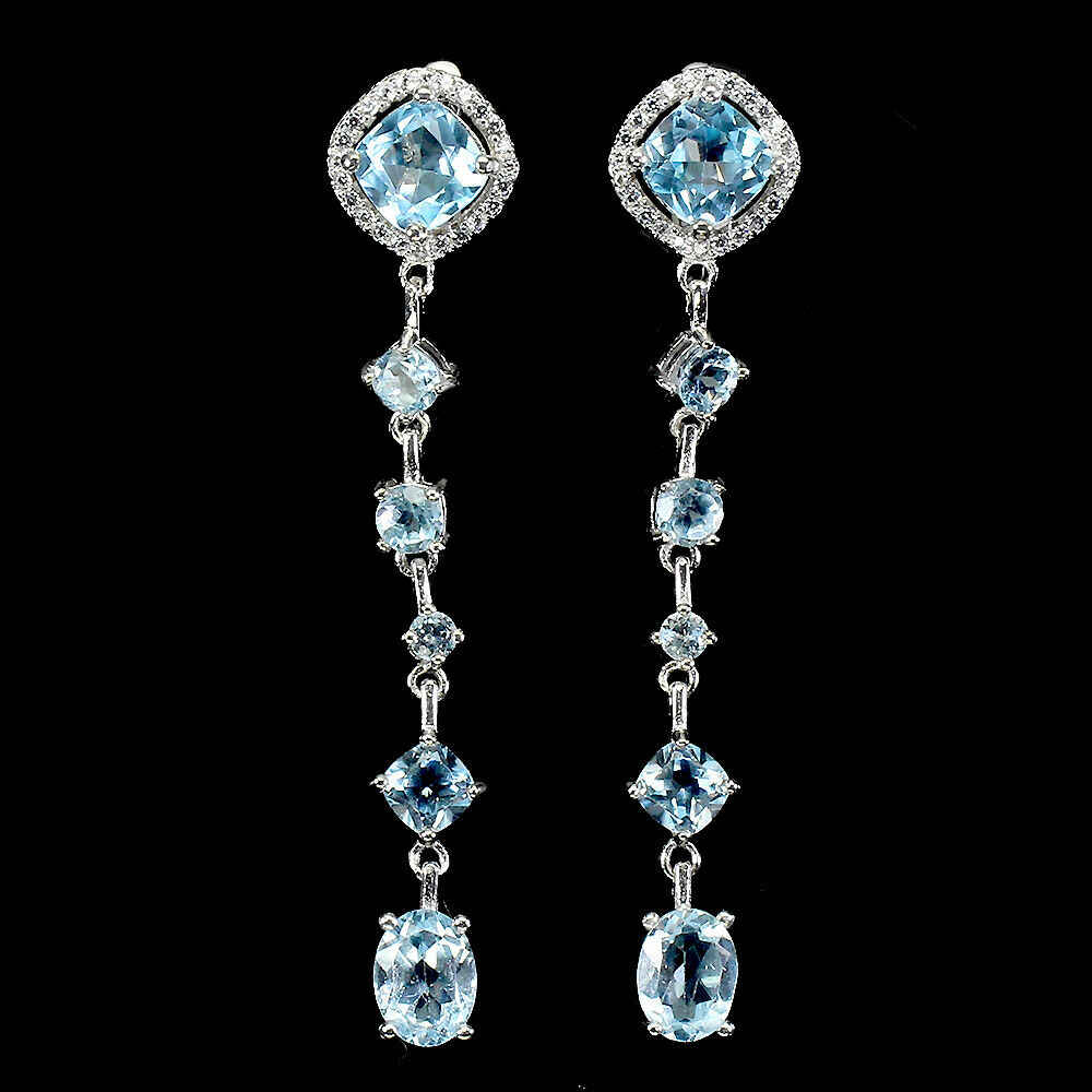 A pair of 925 silver drop earrings set with blue topaz and white stones, L. 6cm.