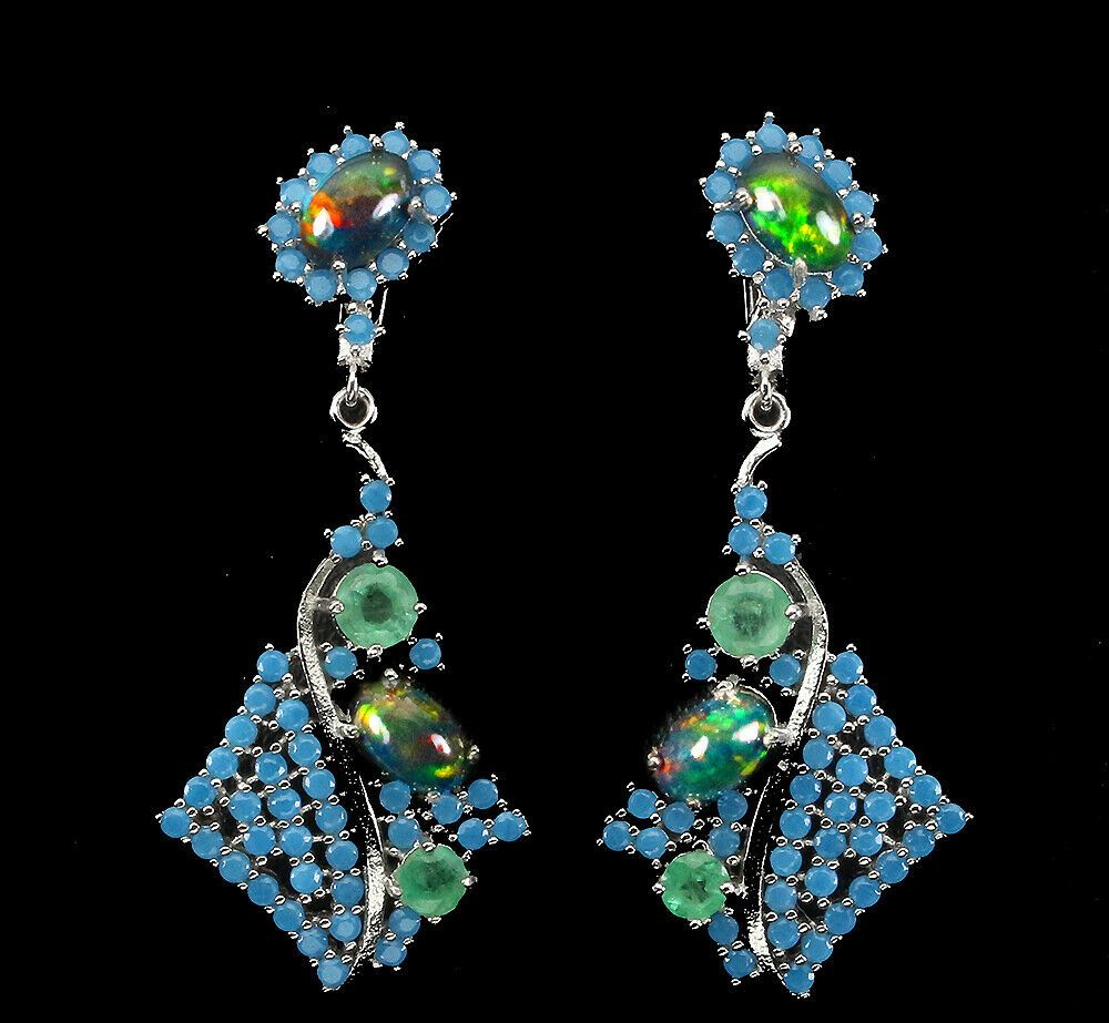 A pair of 925 silver drop earrings set with turquoise, black opal and emeralds, L. 4cm.