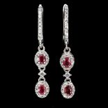 A pair of 925 silver ruby and white stone set drop earrings, L. 3.7cm.