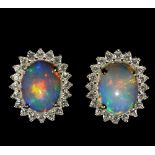 A pair of 925 silver gilt cluster earrings set with cabochon cut opal and white stones, L. 1cm.