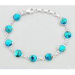 A 925 silver bracelet set with cabochon cut turquoise, L. 20cm.