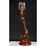 Dr. Njoku Kenneth, "Bond", bronze sculpture, 95 x 28 x 29cm, 18kg, c. 2017. This piece presents