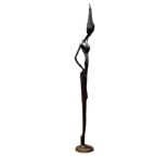 Dr. Njoku Kenneth, "Tall among equals", bronze sculpture, 325 x 42 x 31cm, 50kg, c. 2018. Presents a