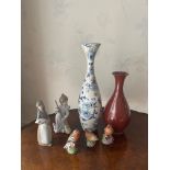 Two Lladro porcelain figurines of children with two porcelain vases and three Royal Worcester bird
