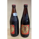 Two bottles of 1966 Watney Mann World Cup ale.