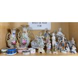 A quantity of mixed porcelain figurines and other items.