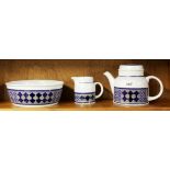 A Royal Doulton stoneware Tangier pattern teapot, milk jug and large fruit bowl.