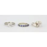 A 925 silver half eternity ring set with round cut blue stones (N.5) together with two further 925