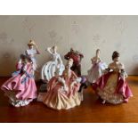 A group of seven Royal Doulton figurines 'The Ballerina' (HN2116), 'Top if the Hill' (HN1849), '