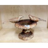 A cast iron bird bath, W. 38cm. H. 23cm.