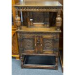 A 1920's carved oak court cupboard with peg joints, 71 x 40 x 115cm.