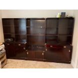A set of three brass mounted military style library bookcase units, overall W. 279cm. H. 176cm.