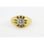 A yellow metal (tested minimum 9ct gold) signet ring set with a large brilliant cut diamond,