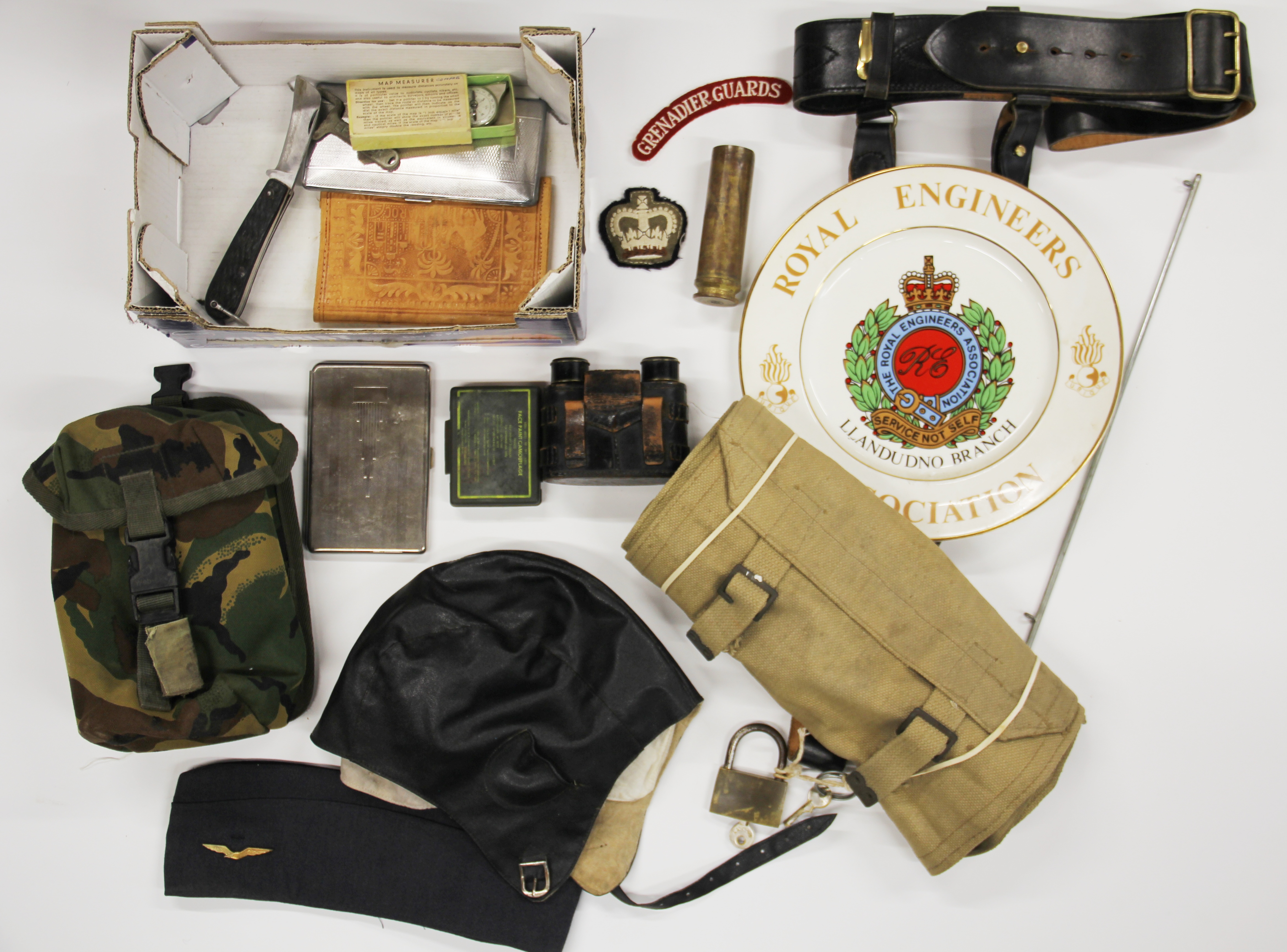 A box of mixed military and other items.