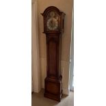 A 20th century chiming grandmother clock with silvered brass dial, H. 190cm.