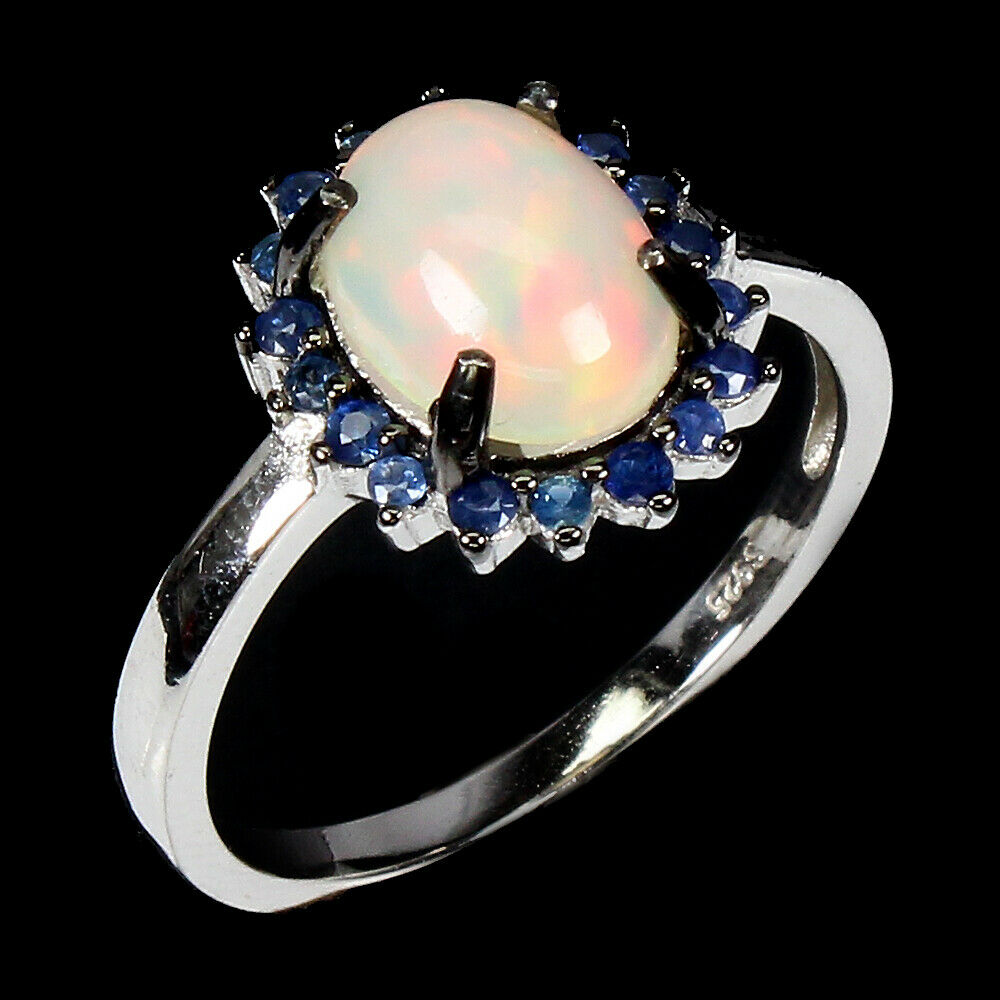 A 925 silver cluster ring set with cabochon cut opal surrounded by sapphires, (Q). - Bild 2 aus 2