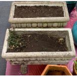 A pair of vintage oblong concrete planters with lions paw feet seprate supports, L. 93 x 44 x 36cm.