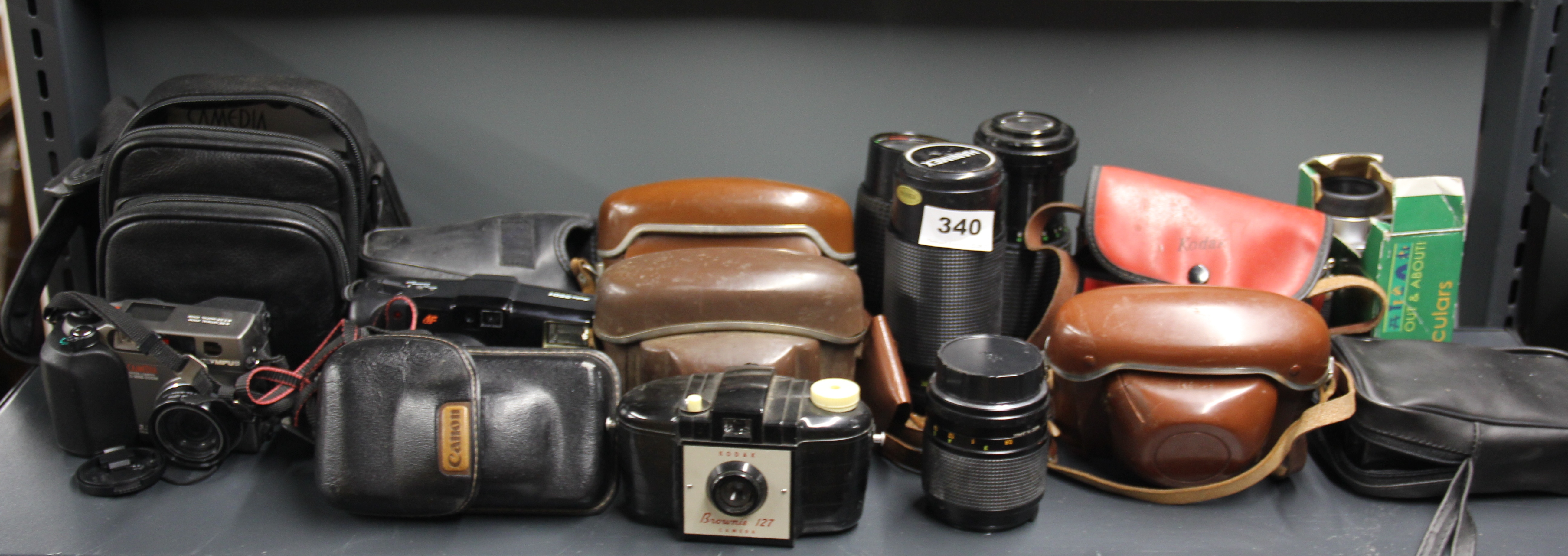 A group of mixed cameras and lenses. - Image 2 of 2