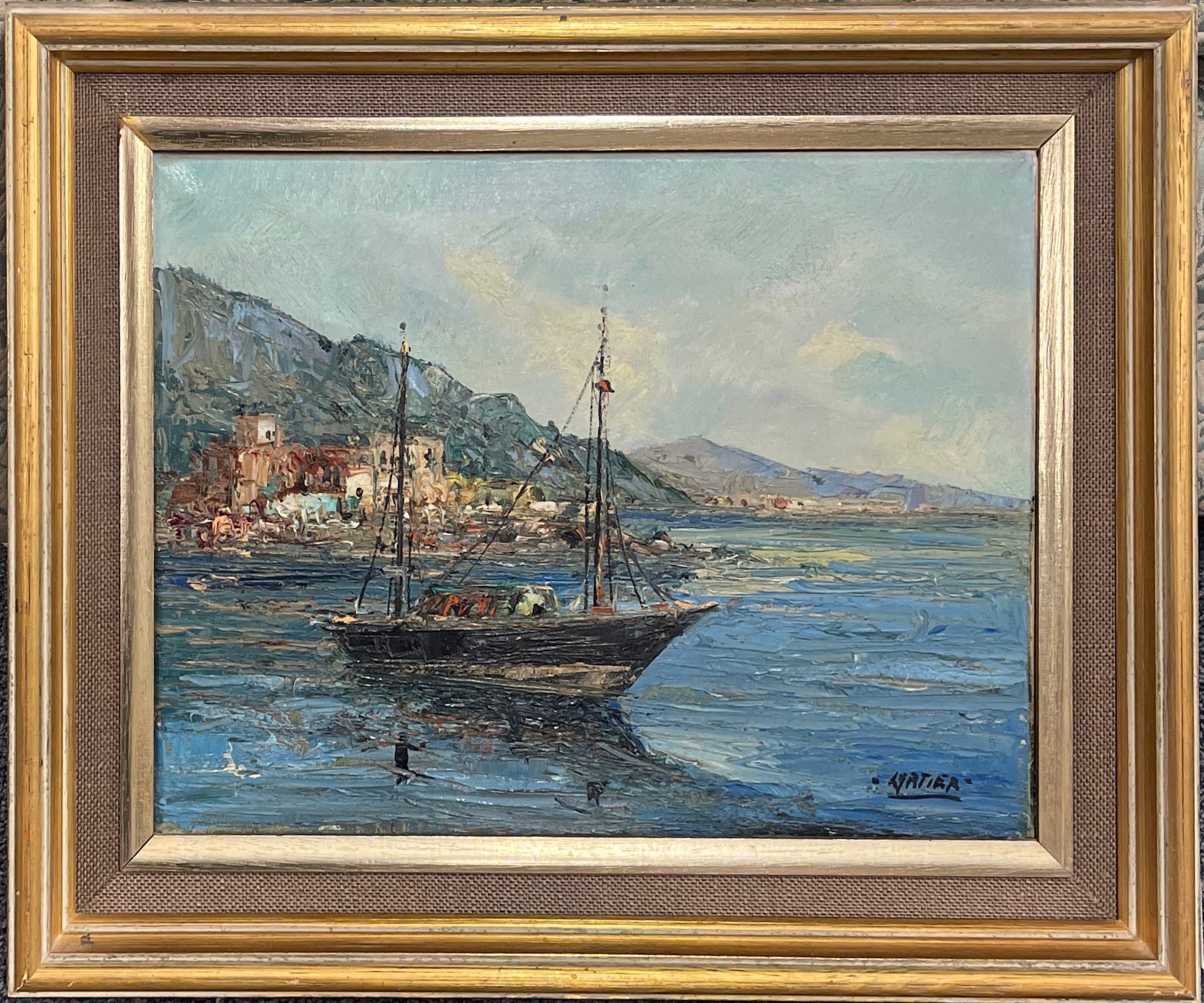 A gilt framed oil on canvas of a Mediterranean scene signed Lirtier, frame size 54 x 44cm.
