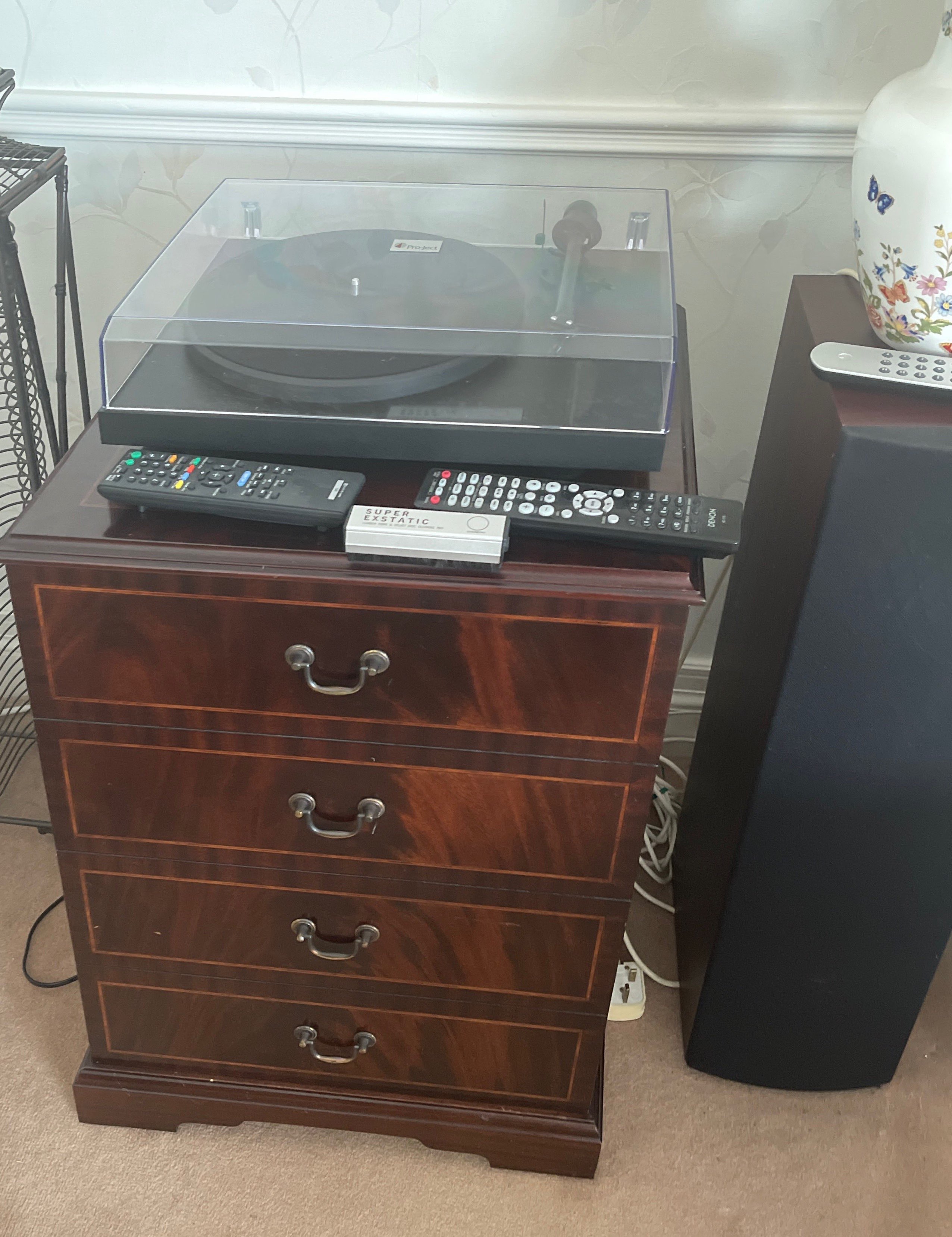 A Denon Hi-Fi amplifier with a Cambridge audio CD player and Pro-Ject deck and pair of KEF