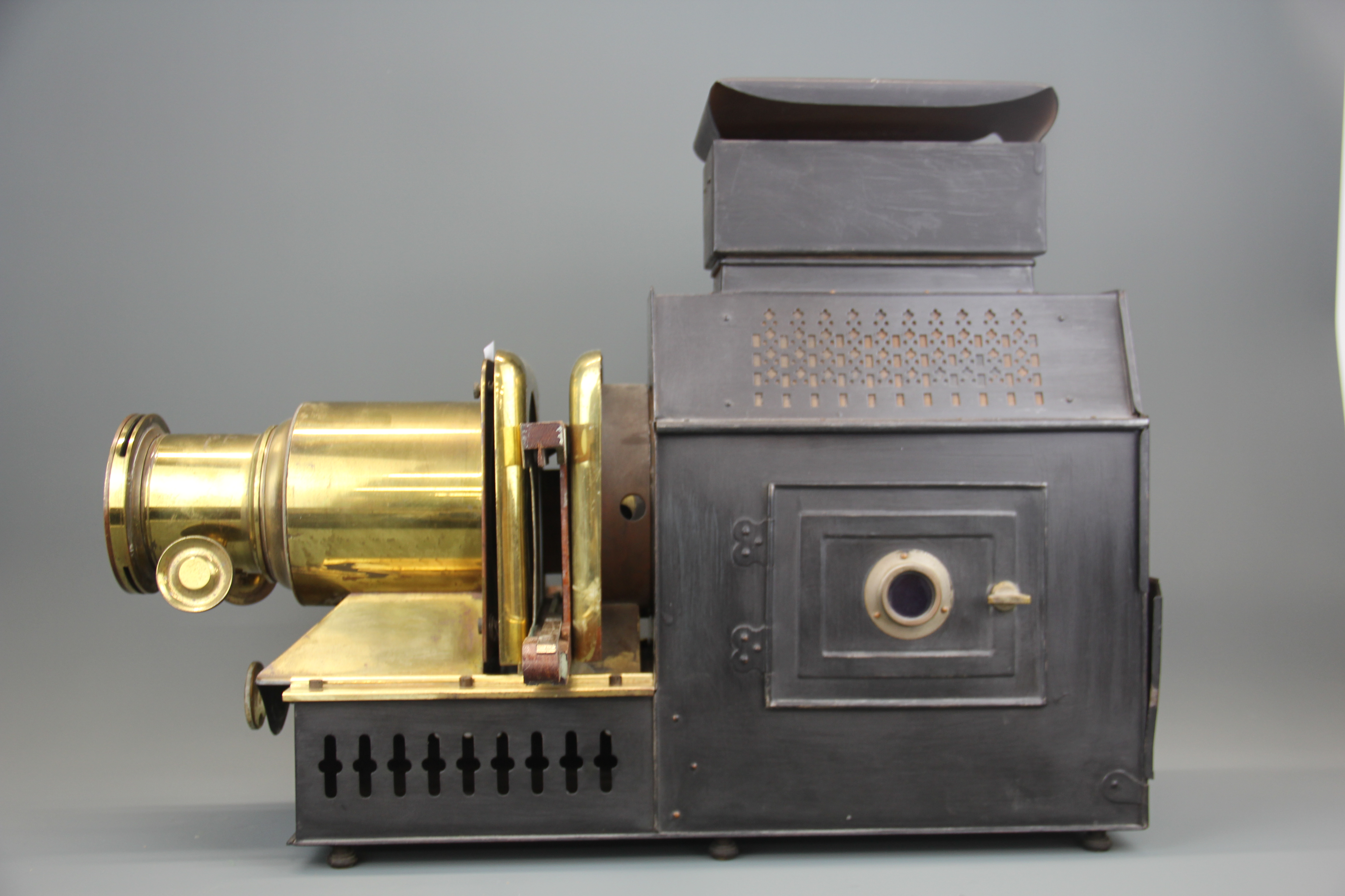 A Victorian Husband and sons brass and tin magic lantern projector with some lantern slides. - Image 2 of 3