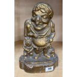 A Victorian painted cast iron doorstop of Mr Punch dressed as a Roman emperor with a dog, H. 34cm.