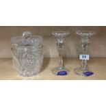 A pair of Royal Doulton crystal candlesticks and a cut crystal biscuit barrel.